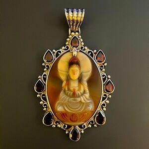 Sterling, Garnet and stone deity pendant